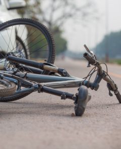 Accident car crash with bicycle on road because drunk driving.